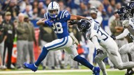 Colts' Taylor adds 153 yards, 3 more TDs to MVP