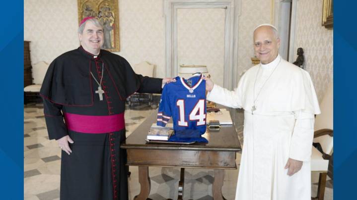Bishop Fisher presents Pope Leo with Bills jersey during time in Rome