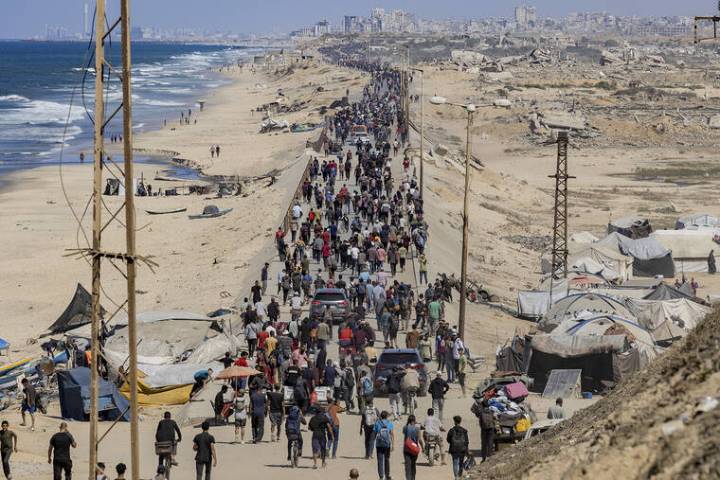 Gaza ceasefire begins, Israel says, as thousands return to the north