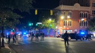 Gunmen kill two, injure 12 in a shootout in a crowd in Alabama capital city's downtown