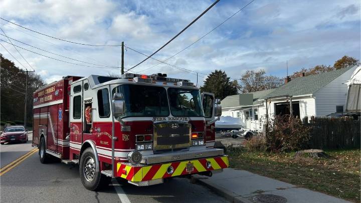 Firefighters rescue person trapped under boat in Westerly
