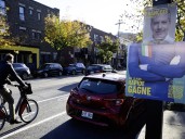Election poster stunt sparks reactions by buffing up candidates