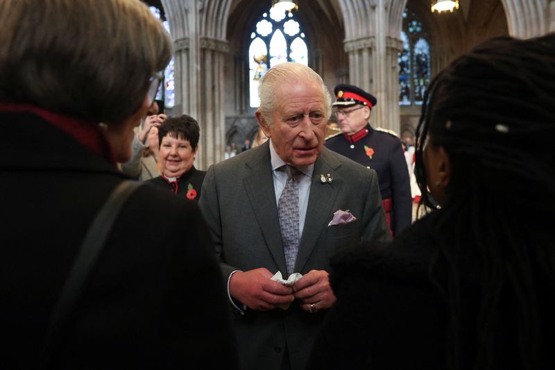 Britain's King Charles heckled over brother Prince Andrew