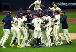 Brewers oust Cubs and will face Dodgers in MLB playoffs