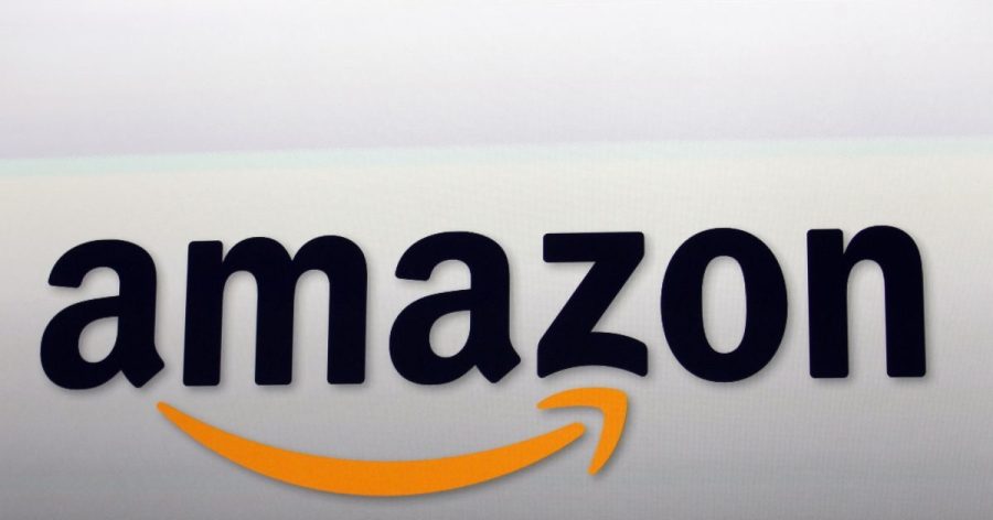 Amazon cuts 14,000 corporate jobs as spending on AI accelerates