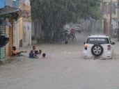Tropical Storm Melissa nears hurricane strength and dumps torrential rain on Caribbean