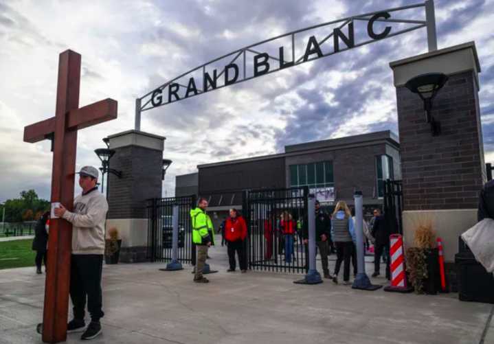 ‘It seems quieter’: Grand Blanc community mourns loss at football stadium
