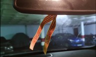 Multa por llevar la cinta de la Virgen del Pilar en el coche y en plenos Pilares