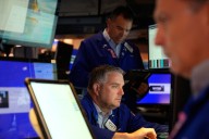 Wall Street edges back from its records after gold tops $4,000 per ounce
