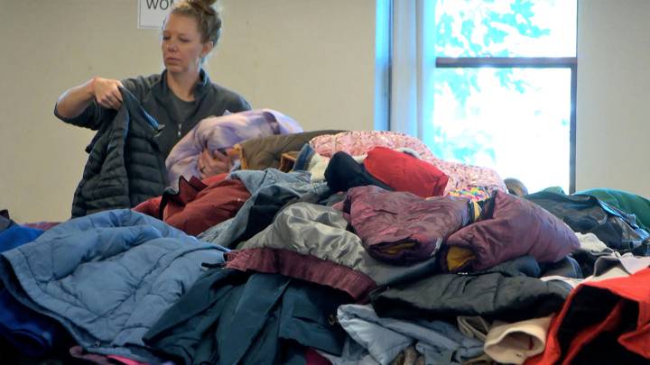 Volunteers Help Set Up Annual Bemidji Coats for the Community Distribution