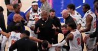 Mike Brown gets a win and a hug from Spike Lee in his first game as Knicks coach