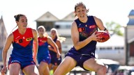 Fremantle Dockers forward Aine Tighe has worrying knee pain after return from reconstruction against Melbourne