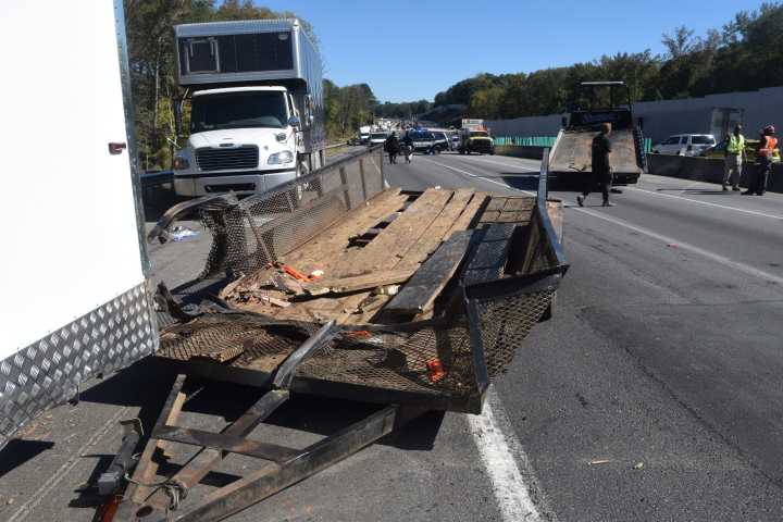Police Seek Driver in Runaway Trailer Crash on I