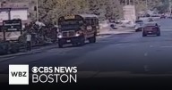 Hingham police say man who drove past stopped school bus claimed car was in self