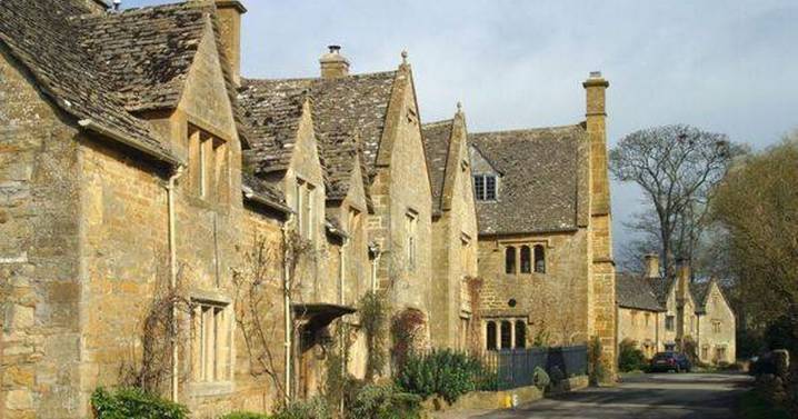 Little-known Cotswolds village with ancient church, thatched cottages and stunning manor house