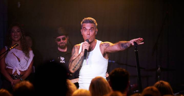 Robbie Williams admits running scared from Taylor Swift
