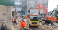 Rescuers search for missing students after Indonesian school collapse kills 49