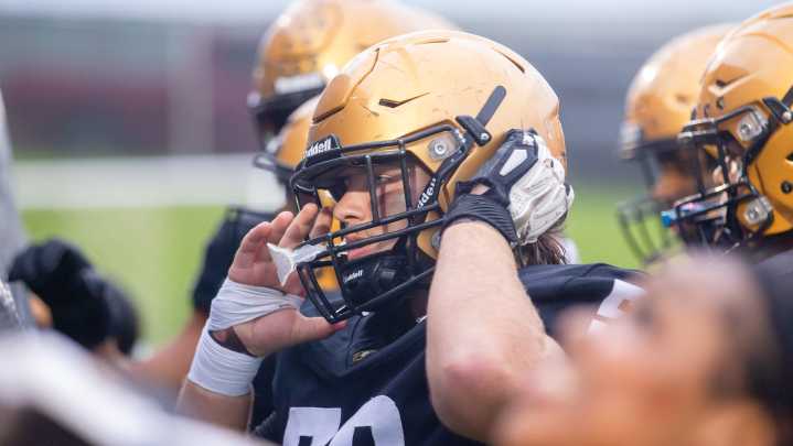Shelby football standout Brett Morgan handles each snap with care