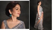Nita Ambani's emerald earrings, bracelet, Hermès bag charm designer attire
