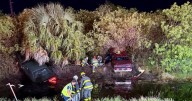 2 people rescued after cars plunge into St. Lucie County canal
