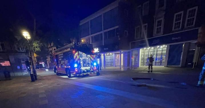 Investigation into what sparked huge fire in roof of Boots store