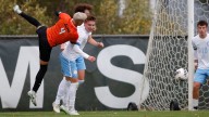Watch Lansing Catholic boys soccer discuss regional win