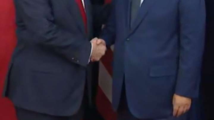 Trump and Xi exchange warm greetings in South Korea