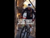 Cyclist breaks record riding up Eiffel Tower