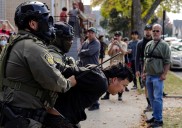 Tear gas deployed as Trump’s immigration agents clash with residents