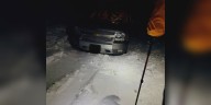 ‘Here we go again!’ Couple from Texas and their dogs rescued after SUV gets stuck on snowy mountain pass