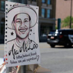 Months after a man was killed at a ‘No Kings’ march, no one has been charged. His wife wants answers