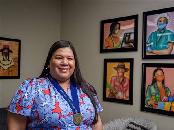 ‘She’s passionate, she’s smart, she’s dedicated’: Migrant advocate gets state honor