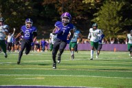 Football player at Massachusetts college sets national rushing record