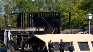 Woman who was confronted by Michigan church gunman says she instantly forgave him for killing dad