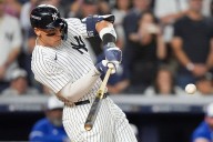 Judge rallies Yankees past Blue Jays 9-6 to avert ALDS sweep