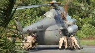 Tyre of copter carrying President gets stuck in concrete; police and fire force had to push