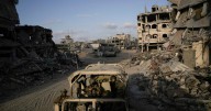 Gaza peace talks appear to gain momentum on the war's anniversary