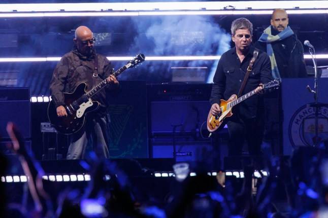 Oasis star Paul ‘Bonehead’ Arthurs pulls out of tour dates after cancer diagnosis