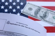 Major US business group sues over Trump's $100,000 H