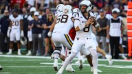 West Virginia quarterback Nicco Marchiol makes move amid foot injury