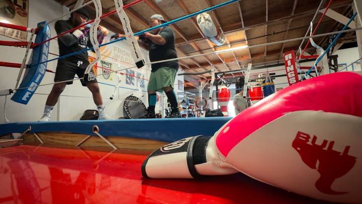 Boxer Jigg Johnson rolls with the punches