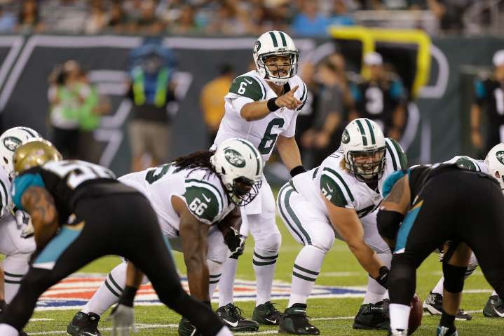 NFL analyst, former QB charged in altercation that left him hospitalized with stab wounds