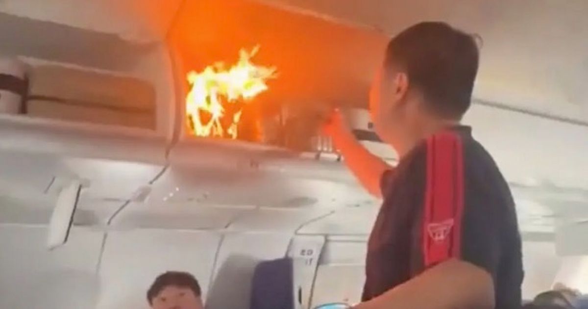 Flames burst out cabin mid-flight as battery catches fire causing emergency landing