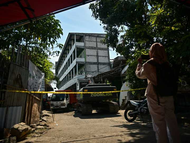 Indonesia ends search for victims of school collapse with at least 61 dead