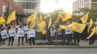 Caregivers at Providence Community Health Center hold informational picket