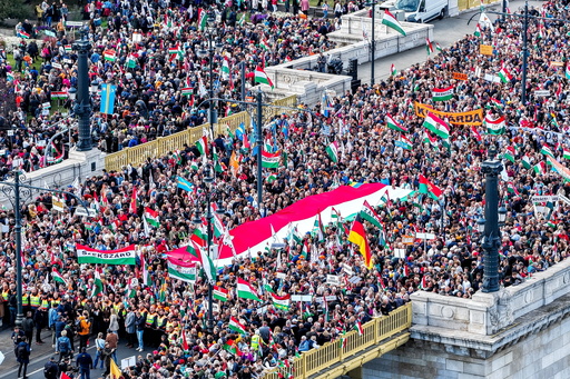 Hundreds of thousands of Hungarians attend rival rallies in Budapest as Orbán faces election test