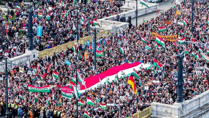 Hundreds of thousands of Hungarians attend rival rallies in Budapest as Orbán faces election test