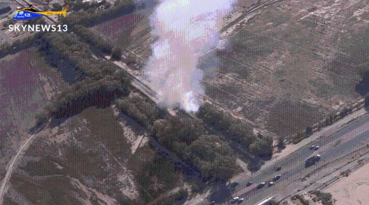 Firefighters respond to brush fire in the South Valley