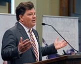 LSU athletic director Scott Woodward resigns, 4 days after the firing of football coach Brian Kelly