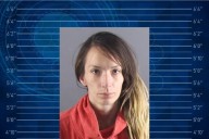 Woman arrested after allegedly hijacking vehicle with needle, male suspect at